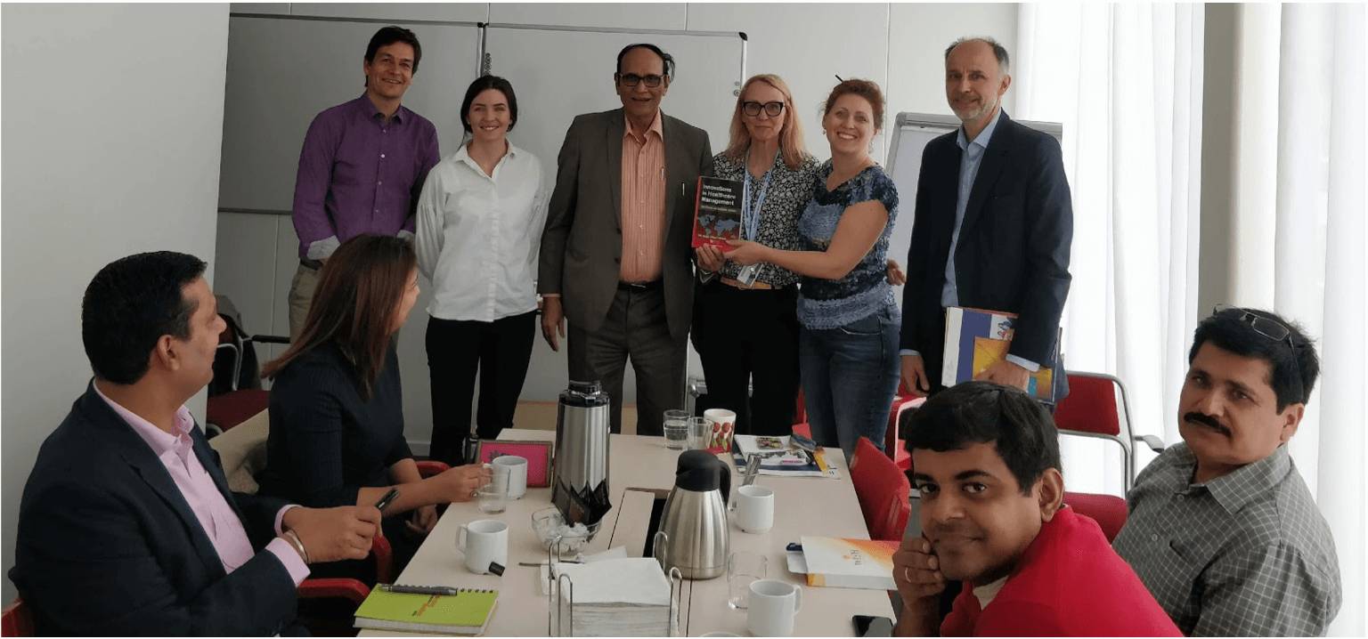 Figure 5 - Dr V K Singh from Indian delegation presented his healthcare innovation book to the chairman of Swecare board and Uppsala regional council, Ms Vivianne Macdisi