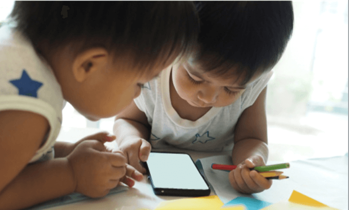 children using mobile phones