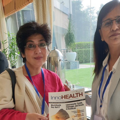 Asha-Kapoor-and-Dr.-Indu-Ahuja-holding-InnoHEALTH-Magazine-at-Patient-Experience-Conclave-and-Awards-2019