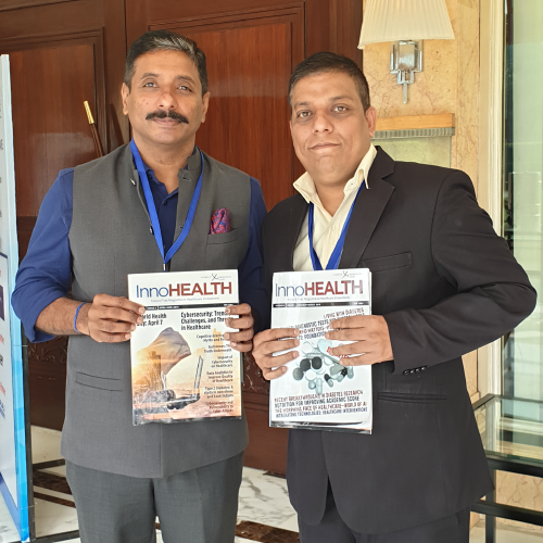 Dr.-Anil-Pillai-and-Sanjay-Gaur-holding-the-InnoHEALTH-Magazine-at-Patient-Experience-Conclave-and-Awards-2019